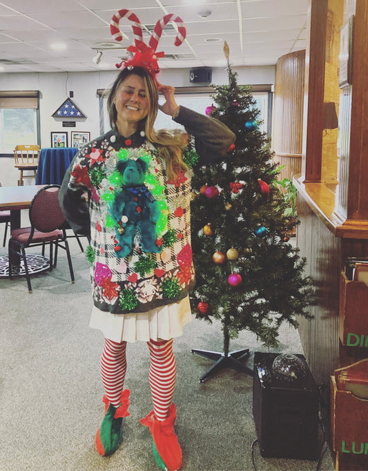 Ugly Sweater and Candy Cane head piece to bring joy to all around.